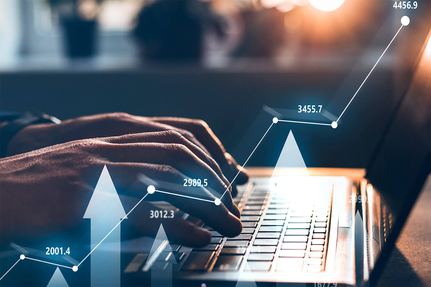 A Continental employee’s hands typing on a computer while using Financial software for Financial Reporting and Stock monitoring. 